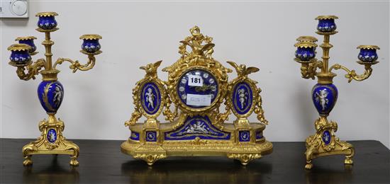 A French ormolu and Sevres style clock garniture